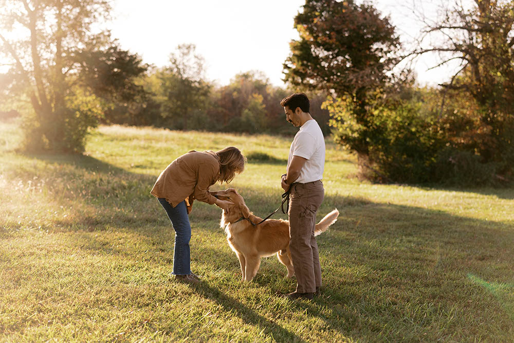 Couple and dog outdoors