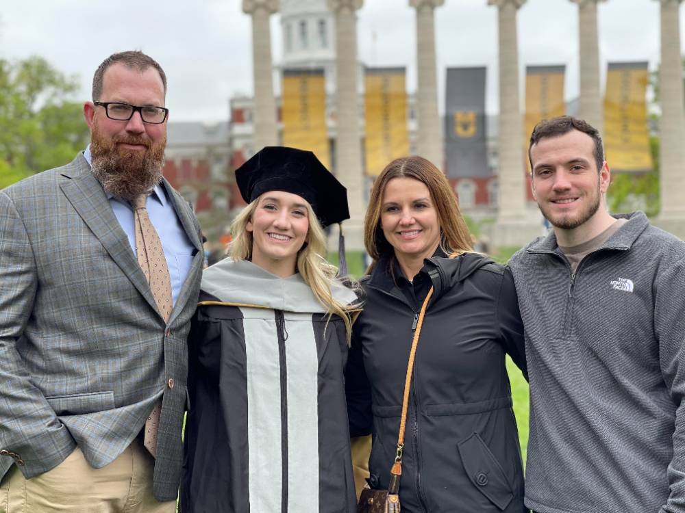 family graduation portrait outdoors